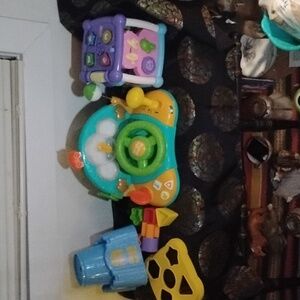 Interactive Learning Toy Set with Blue and Green Accents